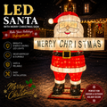 Commercial Holiday Lighting Solutions 3D LED Santa Claus holding Merry Christmas Sign | Large Silk Motif Display