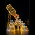 Giant 3D champagne bottle LED motif light wine pouring bubble tunnel pavilion with a red bow.
