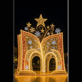Giant 3D musical crown LED motif light walk-through pavilion for commercial shopping mall holiday decorations.